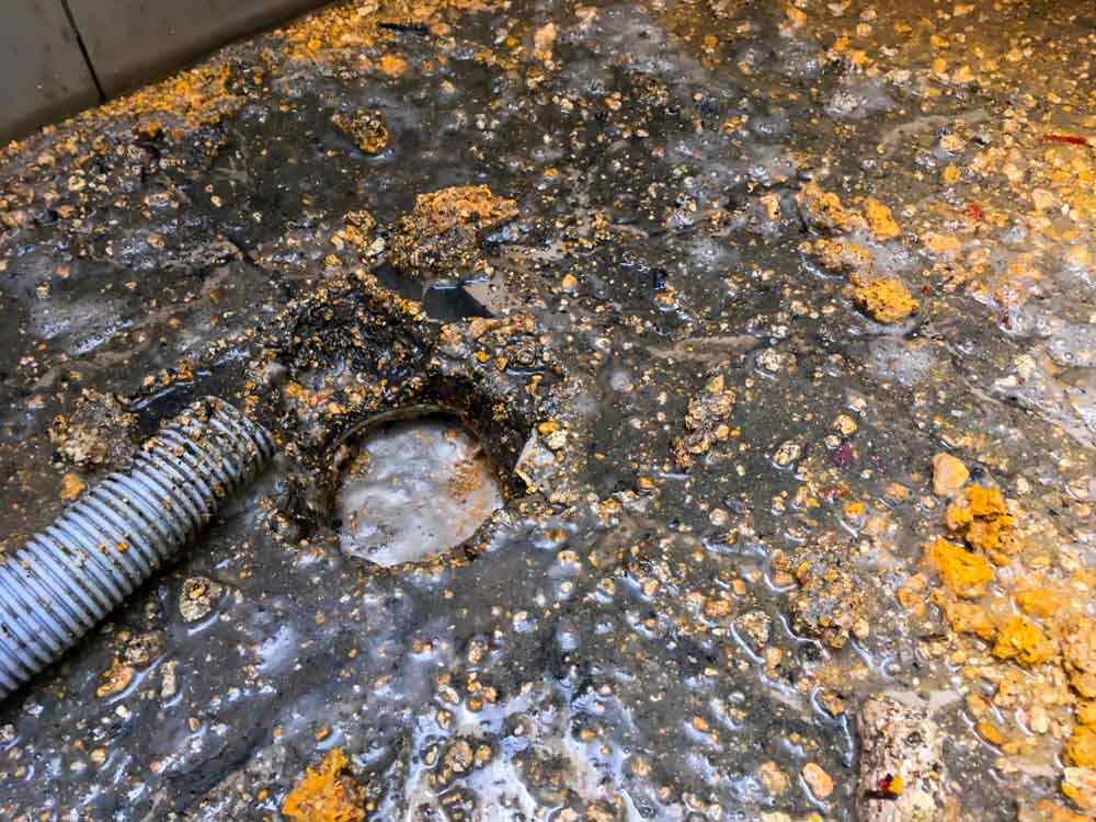 overflowing or backed-up septic tank or drain