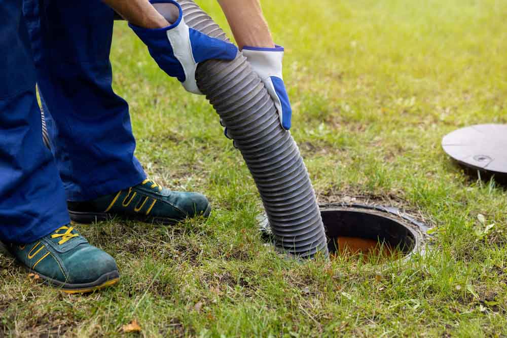 Septic tank pumping services in progress
